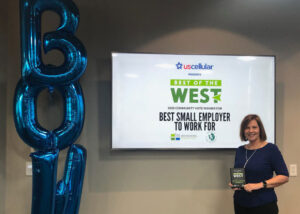 Mary Thomsen pictured with Best of the West Award